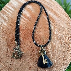 Black crystal key to happiness, tassel necklace